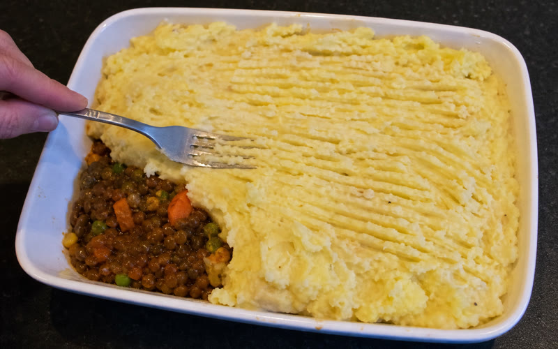 Mash spread over the filling and forked into crispy ridges