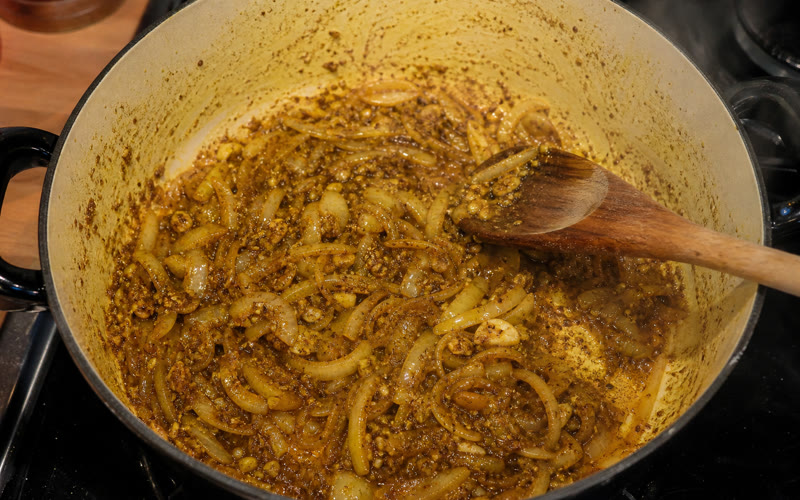 Onions, garlic, ginger and spices building the curry base