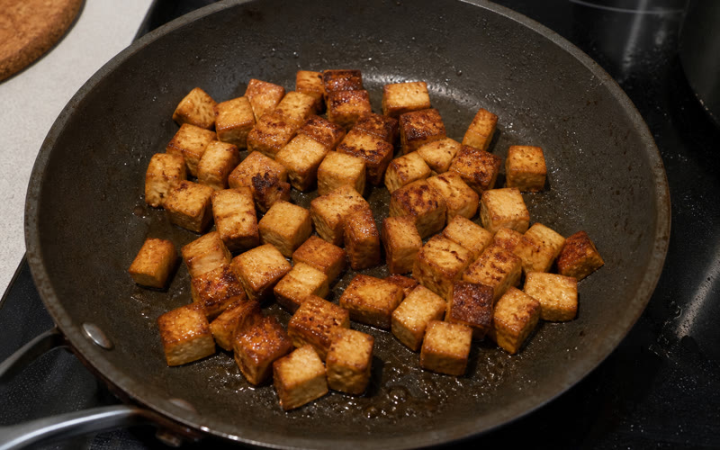 Smoked tofu browning before it goes into the curry